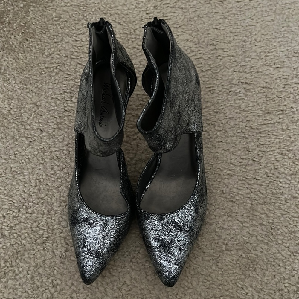 Never been worn Michael Antonio sliver and black heels.